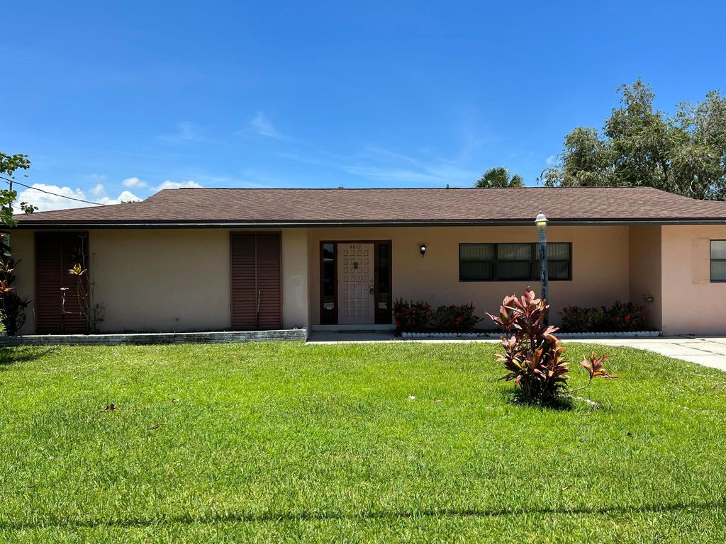 Photo of 4012 Greenwood Drive, Fort Pierce, FL 34982 (MLS # R10916164)
