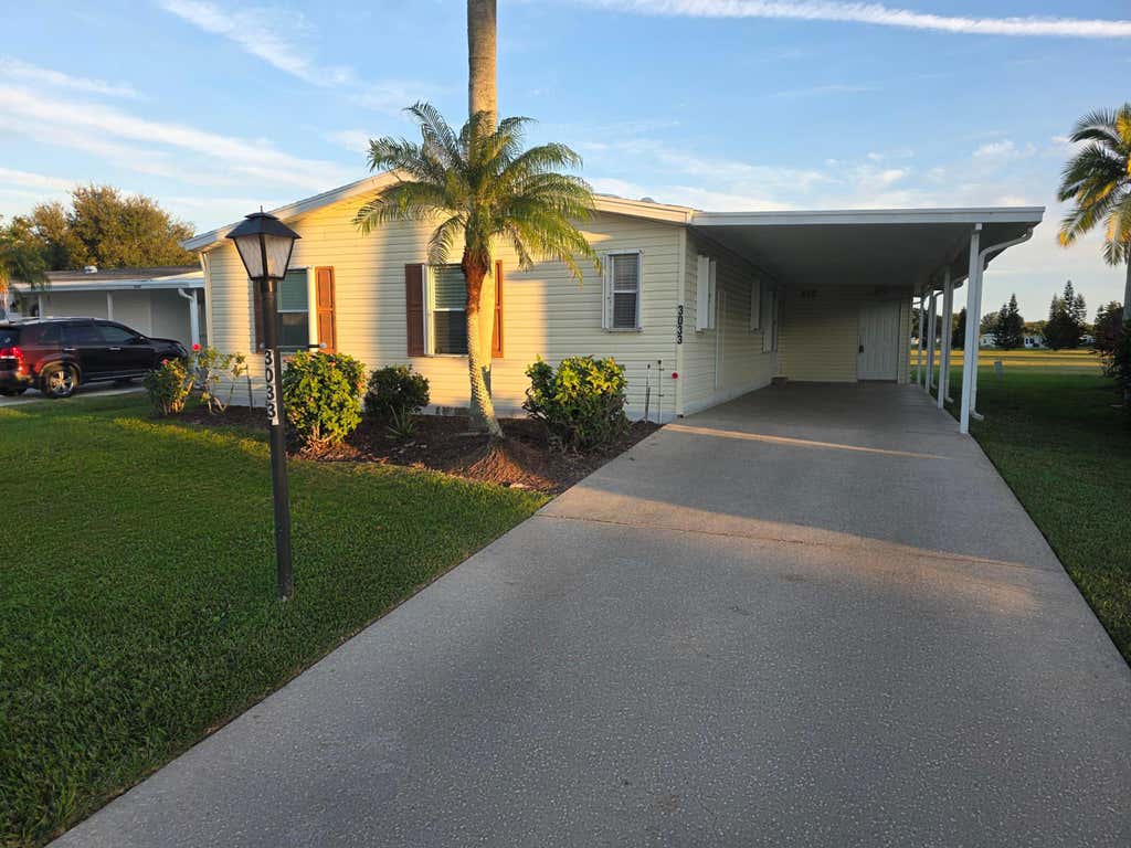 Photo of 3033 Satinleaf Lane, Port Saint Lucie, FL 34952 (MLS # R11147854)