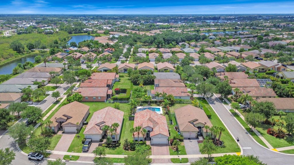 Photo of 9583 SW Flowermound Circle, Port Saint Lucie, FL 34987 (MLS # R11035307)