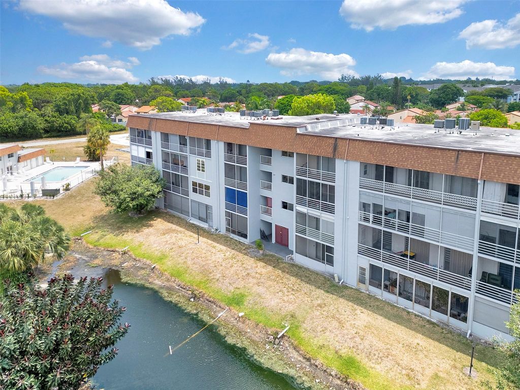 Photo of 6289 Lear Drive #403, Lake Worth, FL 33462 (MLS # B26014615)