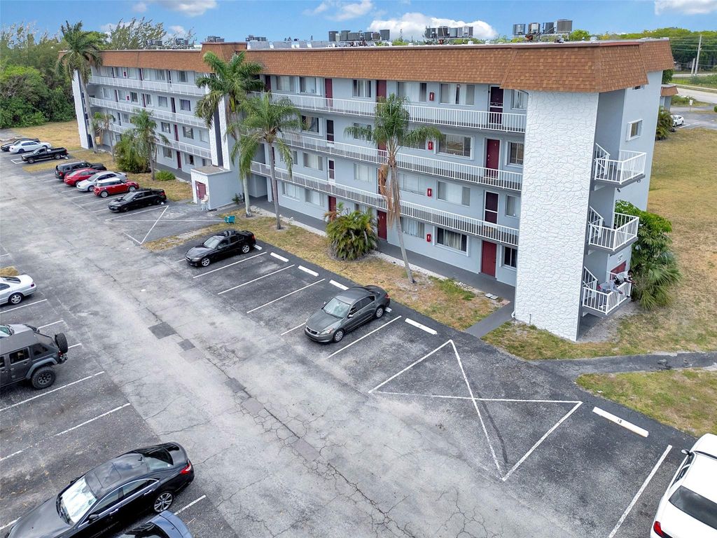 Photo of 6289 Lear Drive #403, Lake Worth, FL 33462 (MLS # B26014615)