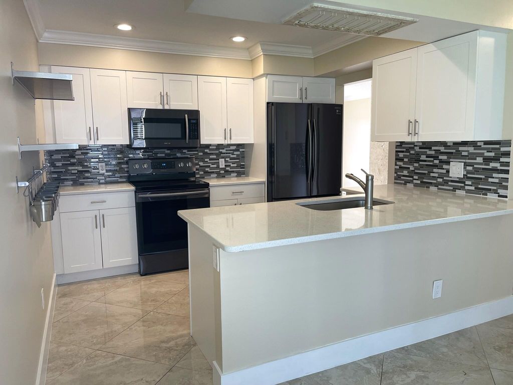 Photo of 1447 Lake Mango Way, West Palm Beach, FL 33406 (MLS # R11013058)