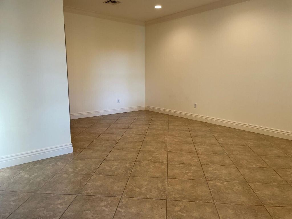 Photo of 149 E Thatch Palm Circle, Jupiter, FL 33458 (MLS # R10960056)