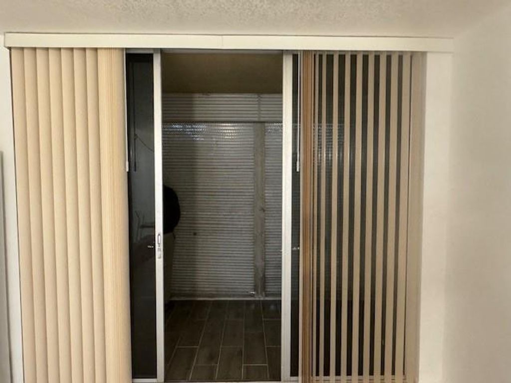 Photo of 3161 NW 47th Terrace #313, Lauderdale Lakes, FL 33319 (MLS # F10542926)