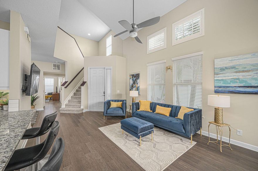 Live in Bedford Park Tradition! Gorgeous 3 bedroom / 2.5 bath / 2 car garage townhouse with large and private fenced in backyard compete with a paver patio and lush landscaping! This townhouse was renovated in 2023 with tile, carpet and fresh paint throughout.The kitchen has newly re-faced white Shaker door cabinets, stylish Subway backsplash, modern tile, a new sink, new faucet and granite countertops. Engineered hardwood flooring throughout the main floor. The main bathroom has a gorgeous walk-in glass enclosed shower. Walking distance to downtown Tradition Square and lake! Close to Cleveland Clinic, Publix, entertainment and dining. Enjoy all that Tradition has to offer!