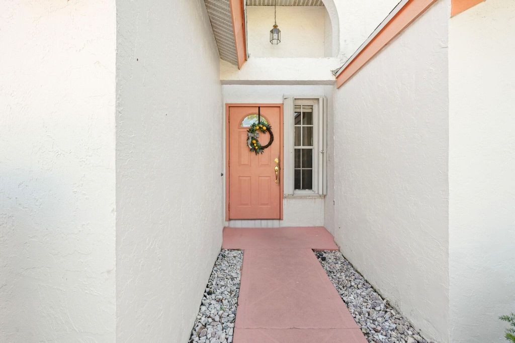 Photo of 300 Hammocks Trail, Greenacres, FL 33413 (MLS # R11134518)