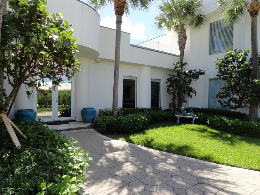 Beautiful 2 Story Contemporary direct ocean front home. 5BR/5BA, (2) 1/2BA, 5 large terraces on the 2nd floor, over-sized 3 car garage, and pool.