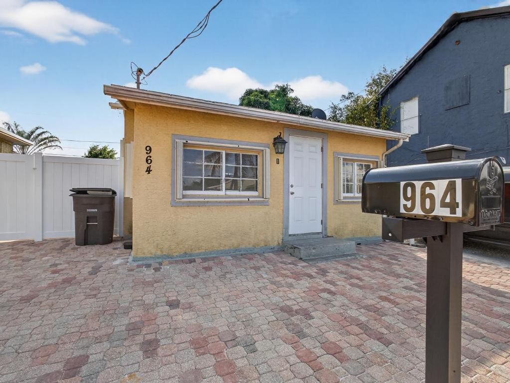 Photo of 964 W Lakewood Road, West Palm Beach, FL 33405 (MLS # R11142129)