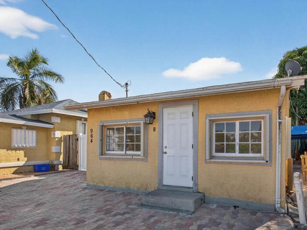 Photo of 964 W Lakewood Road, West Palm Beach, FL 33405 (MLS # R11142129)