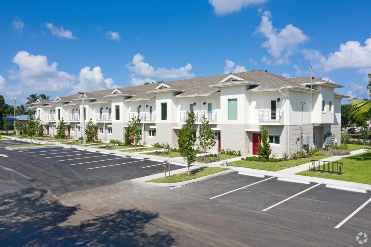 Modern and spacious 3 bed 3 bath newer-build townhome in Lake Worth with parking, community pavilion, grilling area, and low move-in costs! Welcome to your new home in the heart of Lake Worth! This beautifully designed, newer-build townhome offers the perfect blend of modern style, comfort, and convenience. Featuring clean lines, high ceilings, and an open-concept layout, the home is filled with natural light and showcases upscale finishes throughout. Whether you're entertaining or relaxing, the spacious design makes everyday living feel effortless.Inside, you'll find a sleek kitchen with quartz countertops, stainless steel appliances, and custom cabinetry that opens to a large living and dining area--ideal for hosting or unwinding.