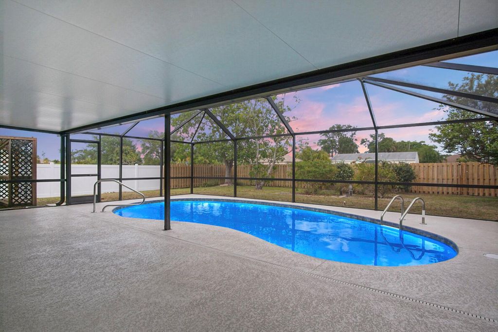 Photo of 1931 SE Joyner Circle, Port Saint Lucie, FL 34952 (MLS # R10983008)