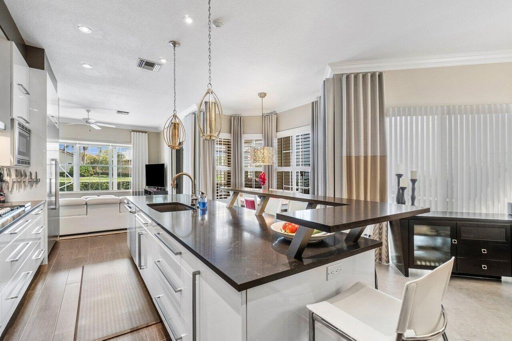 Photo of 621 Masters Way, Palm Beach Gardens, FL 33418 (MLS # R10947580)