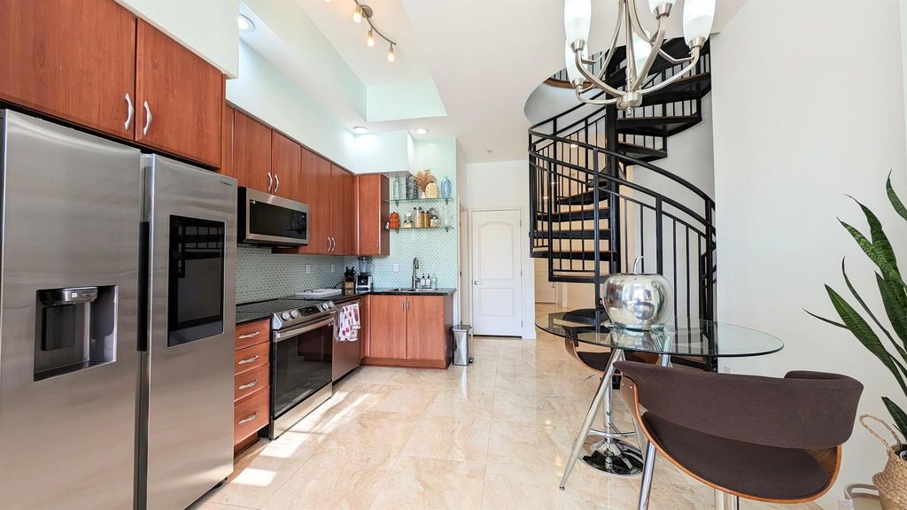 Photo of 801 S Olive Avenue #403, West Palm Beach, FL 33401 (MLS # R11121945)