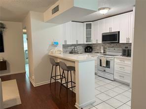 All ages 2/2 Condo for Sale on the 2nd Floor in move-in condition! Corner unit, Wood and Carpet floors, Remodeled kitchen, Wood cabinets, Quartz Counters, brand new tankless water heater, washer and dryer inside unit, Impact windows around the property. Unit is located close the main roads, shopping centers, gym, and supermarkets. Pets allowed, Peaceful Community. Low HOA includes water and Cable, no assestments, one year rental restriction.