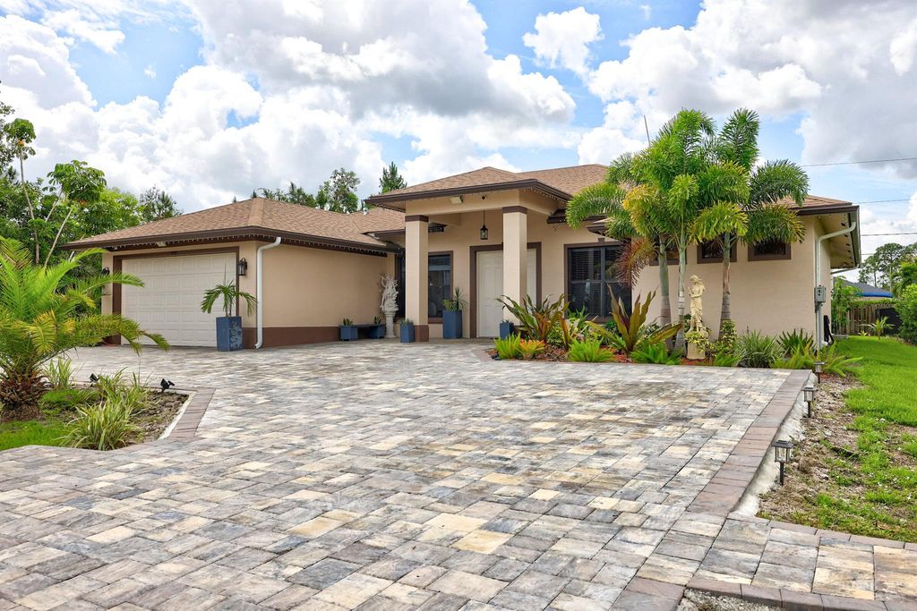 Photo of 340 SW Film Avenue, Port Saint Lucie, FL 34953 (MLS # R11016680)
