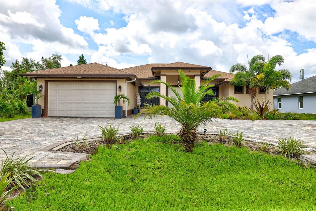 Photo of 340 SW Film Avenue, Port Saint Lucie, FL 34953 (MLS # R11016680)