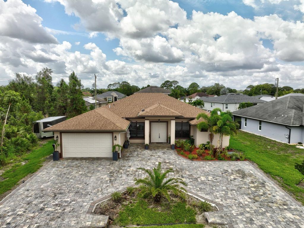 Photo of 340 SW Film Avenue, Port Saint Lucie, FL 34953 (MLS # R11016680)
