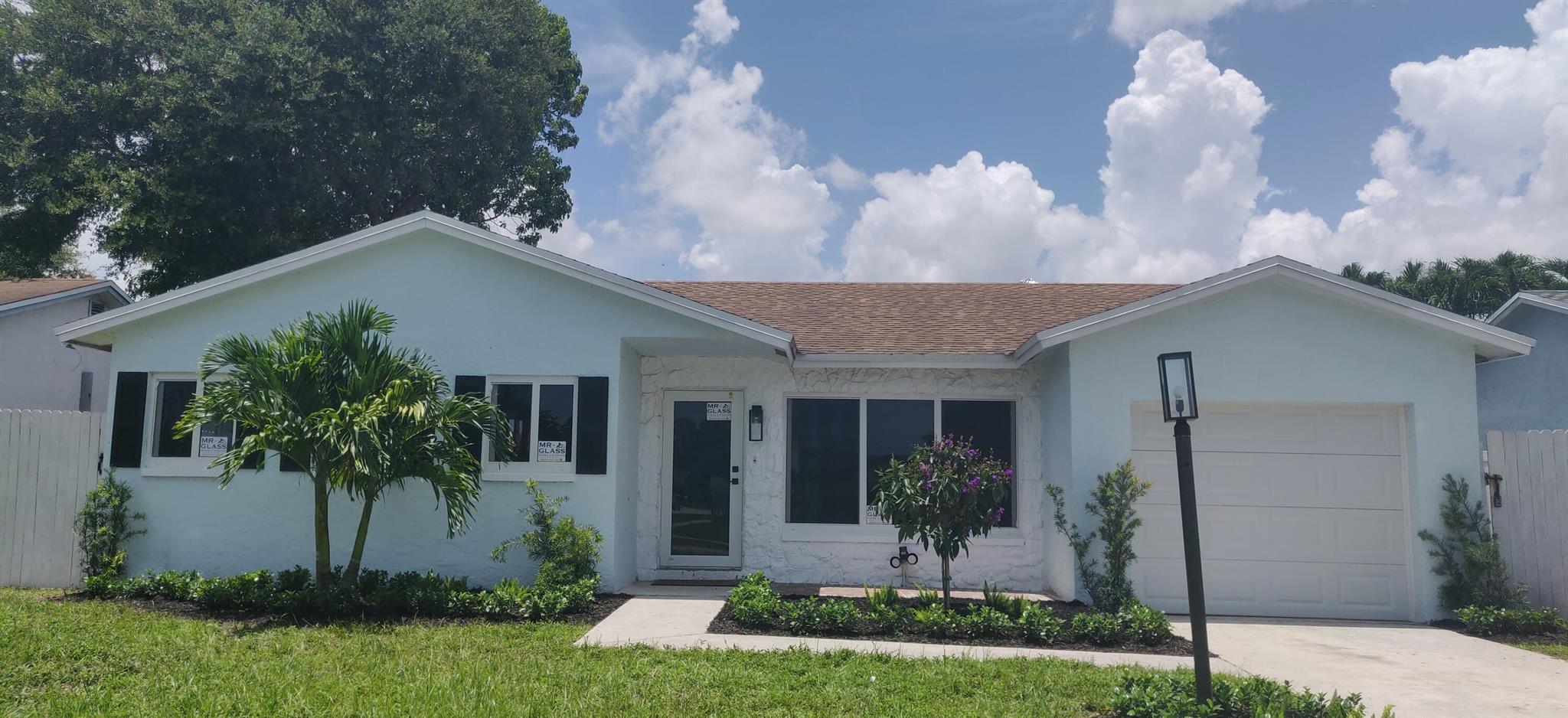 TASTEFULLY REMODELED BEAUTIFUL, BRIGHT AND AIRY 3/2 PLUS DEN SINGLE FAMILY HOME WITH 1 CAR GARAGE IN A GREAT, WEST BOCA LOCATION. HURRICANE IMPACT WINDOWS THROUGHOUT THE HOUSE. SPACIOUS EAT -IN KITCHEN WITH STAINLESS STEEL APPLIANCES, GRANITE COUNTERTOP, NEW KITCHEN CABINETS. FULLY FENCED BACK YARD, SCREENED, COVERED PATIO.GREAT FOR ENTERTAINING. FULL SIZE WASHER, DRYER. TILE IN LIVING AREAS.LUXURY VINYL IN BEDROOMS. LAWN CARE IS INCLUDED IN THE RENT.