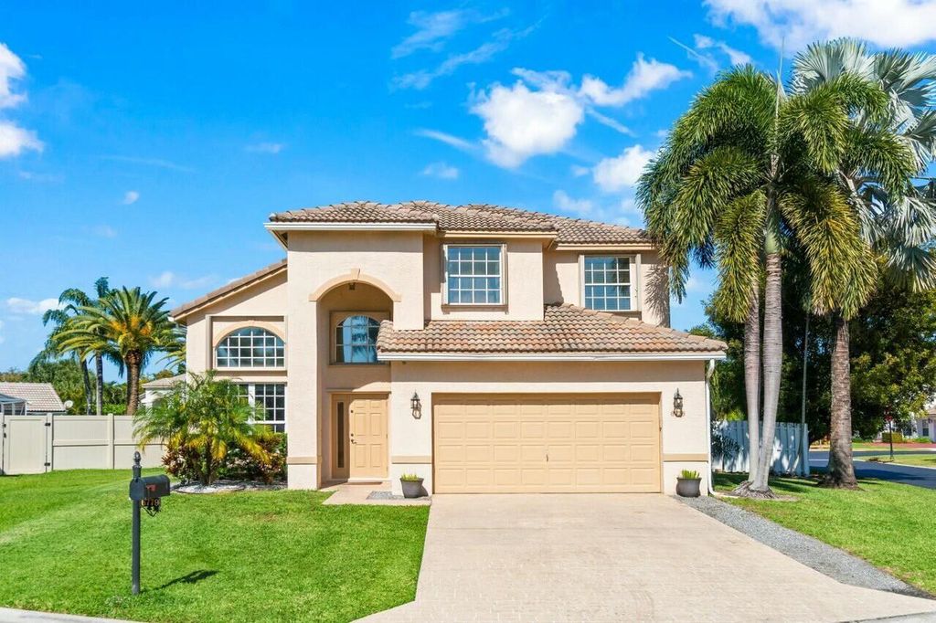Photo of 6779 Barrier Reef Street, Lake Worth, FL 33467 (MLS # B26039419)
