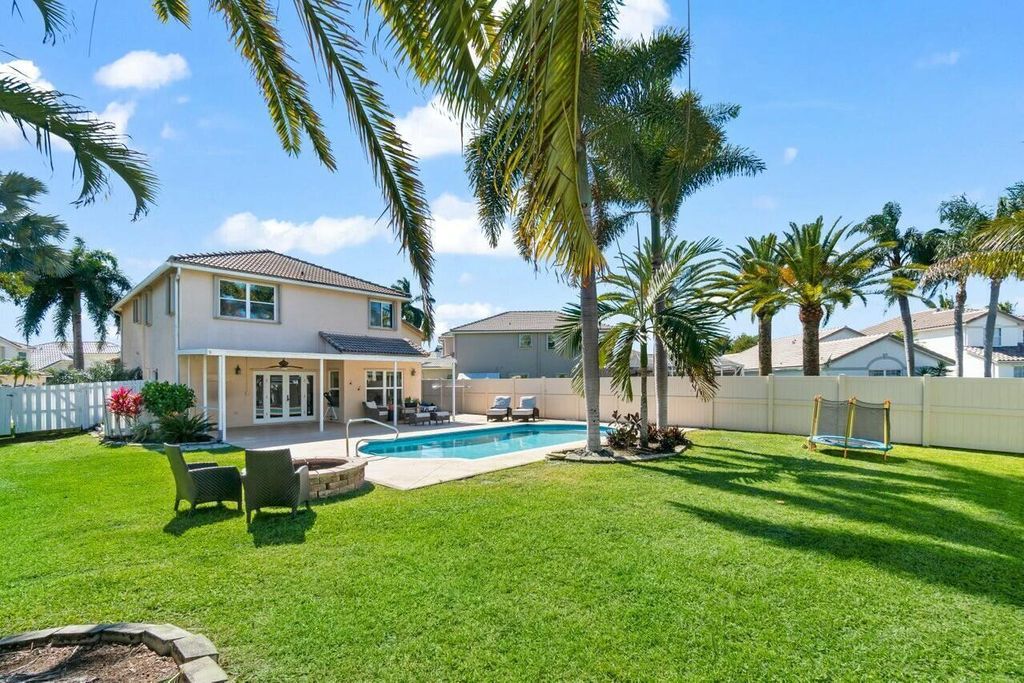 Photo of 6779 Barrier Reef Street, Lake Worth, FL 33467 (MLS # B26039419)
