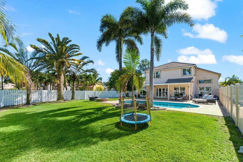 Photo of 6779 Barrier Reef Street, Lake Worth, FL 33467 (MLS # B26039419)