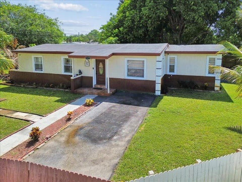 Photo of 1313 NW 13TH Court, Fort Lauderdale, FL 33311 (MLS # B26053450)