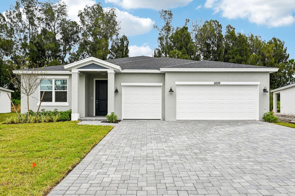 Photo of 5629 Hampton Park Circle, Vero Beach, FL 32966 (MLS # B26042113)