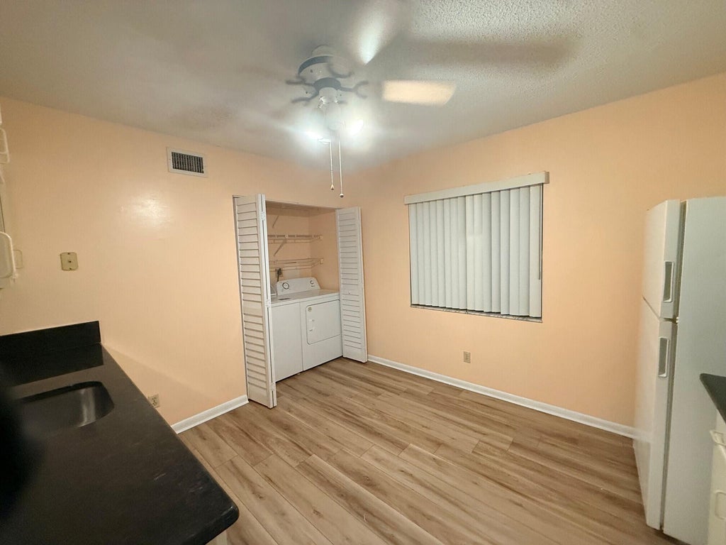 Photo of 7406 Woodmont Avenue #106, Tamarac, FL 33321 (MLS # B26078043)