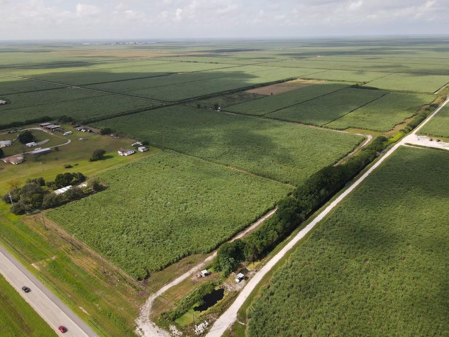Rare opportunity to purchase 65 acres of land on Hwy 27. There is access directly from highway. Do not access property without permission. Price includes 2 parcels that are being sold together. Front parcel 39 acres. Rear parcel 26 acres. OKEELANTA ADD TRS 27 TO 29 INC 35, 36 & S 1/2 OF TR 37OKEELANTA ADD TR 8 (LESS SLY 125.02 FT), TR 9 (LESS SLY 125 FT OF ELY 18.1FT & TRS 22 THRU 24