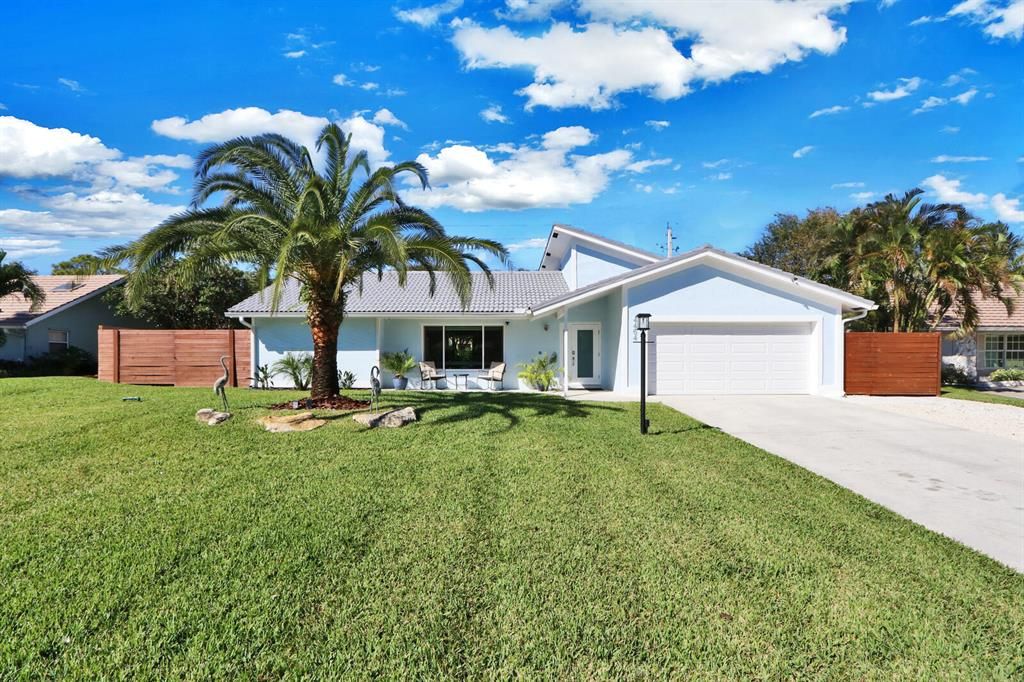 Photo of 4464 Nicole Circle, Jupiter, FL 33469 (MLS # R10779745)