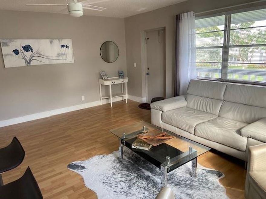 Beautiful second floor corner unit in two story bldg. Fully furnished features central a/c. Screened patio has tile floor and unit conveniently located near pool and clubhouse. Building roof only 5 years old. An abundance of amenities including a 1500 seat theater, fitness center, pickleball, tennis courts, new putting green ,indoor and outdoor pools, bus service, engaging classes and various social events. Don't miss out. This unit is sure to be snapped up quickly. Association says 55+ active living community and pets are allowed in building.