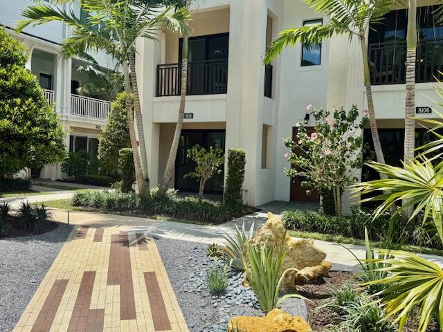 Spectacular 3-story townhome available IMMEDIATELY in the highly desirable community of Alton! This RARELY AVAILABLE CORNER townhome offers 3 bedrooms PLUS den/office (can be used as 4th bedroom), 3.5 baths, 2 car garage with beautiful tile in main living areas, stunning open gourmet kitchen with Quartz counters, stainless steel appliances, gas cooktop and wall oven. Top floor features exclusive master suite with private corner balcony, huge walk-in closet and luxurious master bath. Discover the resort-style community of Alton - this lovely unit is nestled just a short walk to the pool, clubhouse, sport courts and fitness center. Conveniently located in the heart of Palm Beach Gardens, close to Florida's finest restaurants, shops, beaches and nightlife!