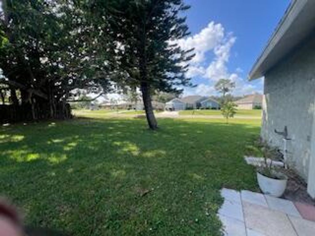 Photo of 902 SE Montrose Avenue, Port Saint Lucie, FL 34983 (MLS # R11034211)