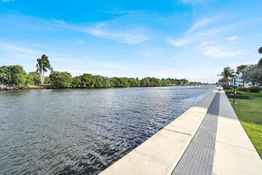 Discover your own slice of paradise in the heart of the desirable Intracoastal community of Colonial Club. This thoughtfully designed 1 bedroom, 1.5 bath condo in Unit 203 blends modern comfort with tropical serenity, boasting an open layout and stunning views of swaying palm trees and lush landscaped grounds from its prime spot in a low-rise two-story building.
Step inside to an inviting open floor plan elevated by soaring 9-foot ceilings, creating a bright and airy living and dining space perfect for relaxation or hosting gatherings. The gourmet kitchen shines with sleek granite countertops, a spacious built-in pantry, and brand-new appliances. A large breakfast bar seamlessly connects to the versatile Florida room, offering extra prep space, storage, and an ideal hub for for entertaining family and friends. 

The tranquil bedroom features a stylish shiplap accent wall, a customized walk-in closet with plentiful hanging space, and direct access to an en-suite bath complete with a walk-in shower and convenient hall linen closet. For added guest comfort, the renovated half bath impresses with white waxed shiplap walls, a luxurious marble-topped vanity, and a sleek modern sliding door for ultimate privacy.

Premium upgrades abound, including hurricane-impact windows for storm protection and energy efficiency, plus solid wood interior doors that enhance durability, soundproofing, and overall value.

Nestled along a vast expanse of the Intracoastal Waterway, Colonial Club is Boynton Beach's premier 55+ community, renowned for its mile-long exclusive seawall promenade perfect for morning walks, breathtaking sunrises, evening sunsets, and observing the lively parade of yachts and boats. Dive into resort-style amenities like the vibrant clubhouse and a newly updated pool and sundeck, lounge chairs, shaded umbrellas, and panoramic waterway vistas.

Location is everything: Just moments from Delray Beach's eclectic dining, boutique shopping, and cultural hotspots, with daily essentialsPublix, Walmart, CVS, and gas stations within a quick stroll. The new Circuit rider program means car-free convenience, while seamless connectivity via I-95 (Woolbright exit just 2 minutes away), the Intracoastal bridge, scenic A1A drives, Palm Beach International Airport (18 minutes) add effortless travel options.

Embrace an active, welcoming lifestyle with a jam-packed social calendar featuring annual barbecues, holiday parties, clubs, fishing contests, golf outings, bingo, cornhole, poker, mahjong, painting classes, and more all fostering lasting friendships at this haven. Ideal for year-round living or seasonal escapes, Colonial Club delivers unmatched waterfront living and community spirit in South Florida's finest setting. Schedule your private tour today and make this gem yours!