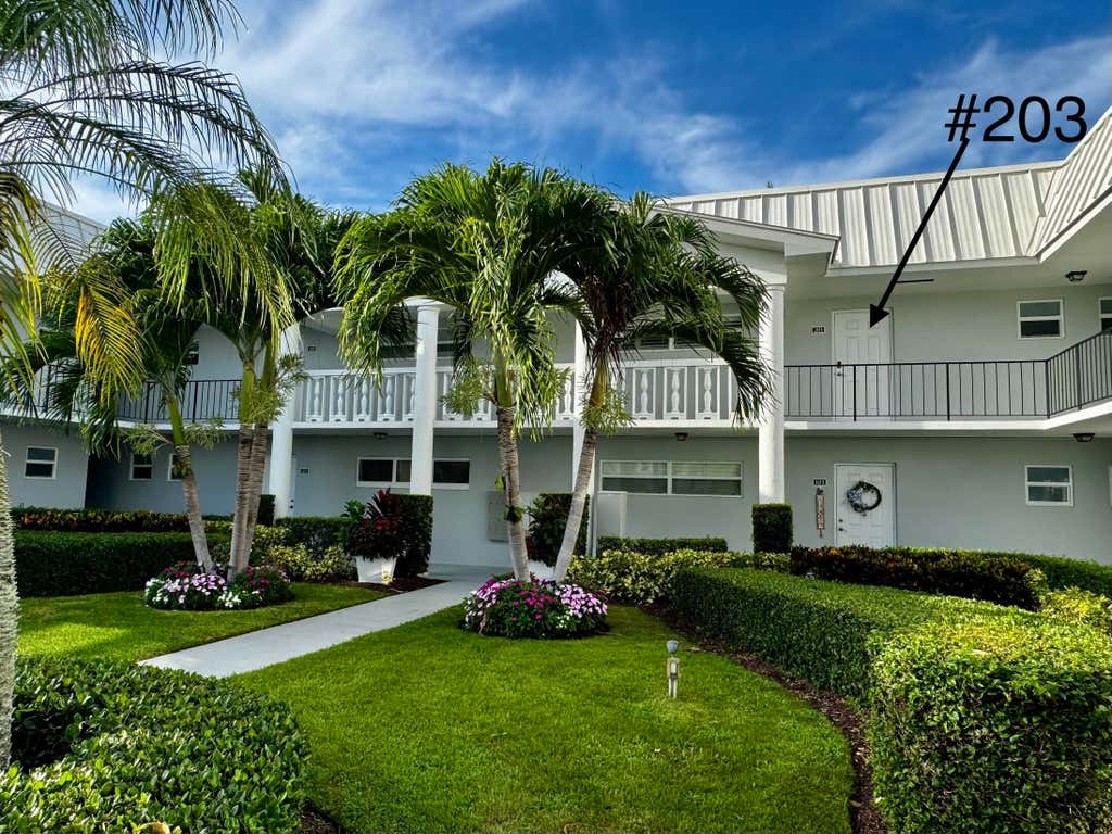 Photo of 32 Colonial Club Drive #203, Boynton Beach, FL 33435 (MLS # R11157764)