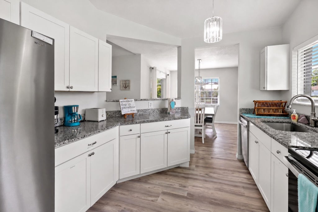 Photo of 2461 SE ROCK SPRINGS Drive, Port Saint Lucie, FL 34952 (MLS # B26076023)