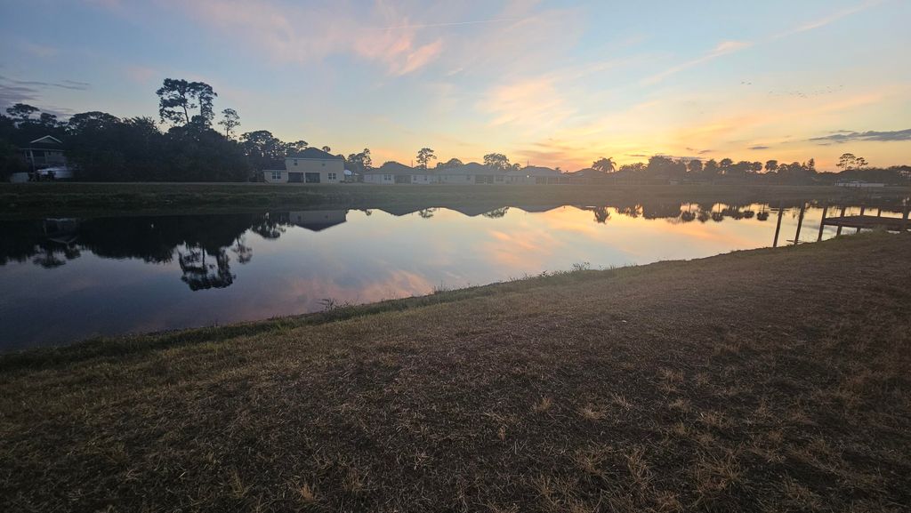 Photo of 1042 SW Sultan Drive, Port Saint Lucie, FL 34953 (MLS # R11159409)