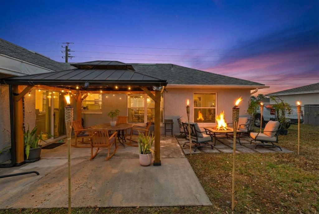 Photo of 1042 SW Sultan Drive, Port Saint Lucie, FL 34953 (MLS # R11159409)