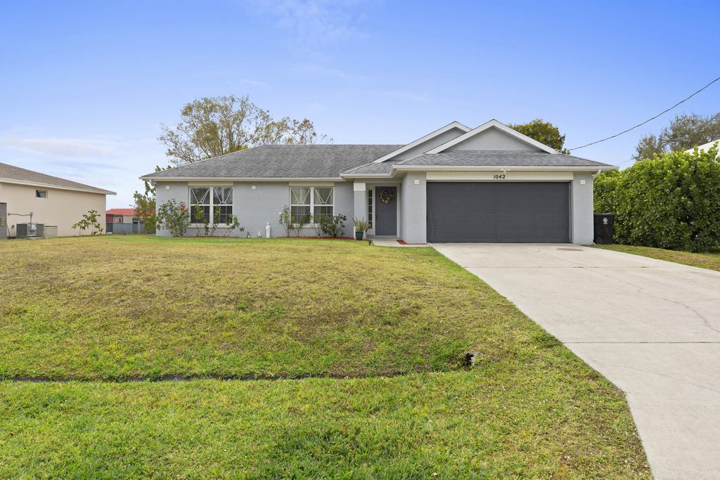 Photo of 1042 SW Sultan Drive, Port Saint Lucie, FL 34953 (MLS # R11159409)