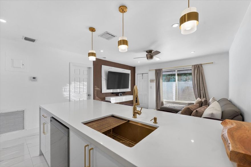 Well-maintained duplex in the heart of Oakland Park offering flexibility and long-term value. Property features a newer roof (less than 5 years old) and recent interior upgrades.Unit A (2 bed / 2 bath): Stainless steel appliances, granite countertops, vinyl flooring, refrigerator less than 5 years old, walk-in closet in second bedroom, and washer/dryer in unit.Unit B (1 bed / 1 bath – owner-occupied): Fully remodeled kitchen with brand-new appliances, quartz countertops, ceramic tile floors, and washer/dryer in unit.