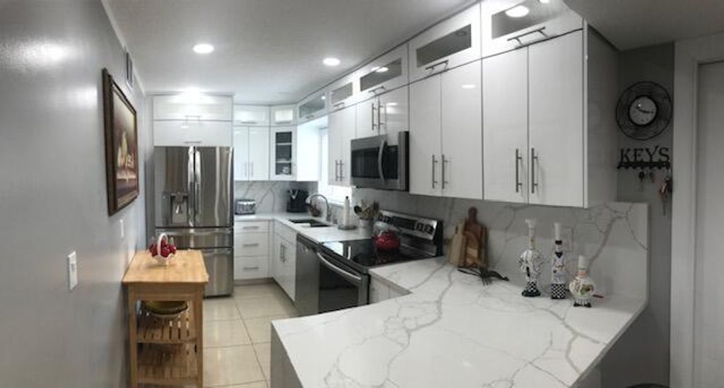 Photo of 227 Golden River Drive, West Palm Beach, FL 33411 (MLS # R10853533)