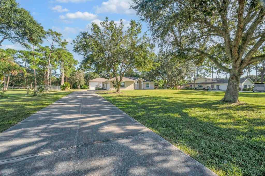 Photo of 8330 Hidden Pines Road, Fort Pierce, FL 34945 (MLS # R11125891)