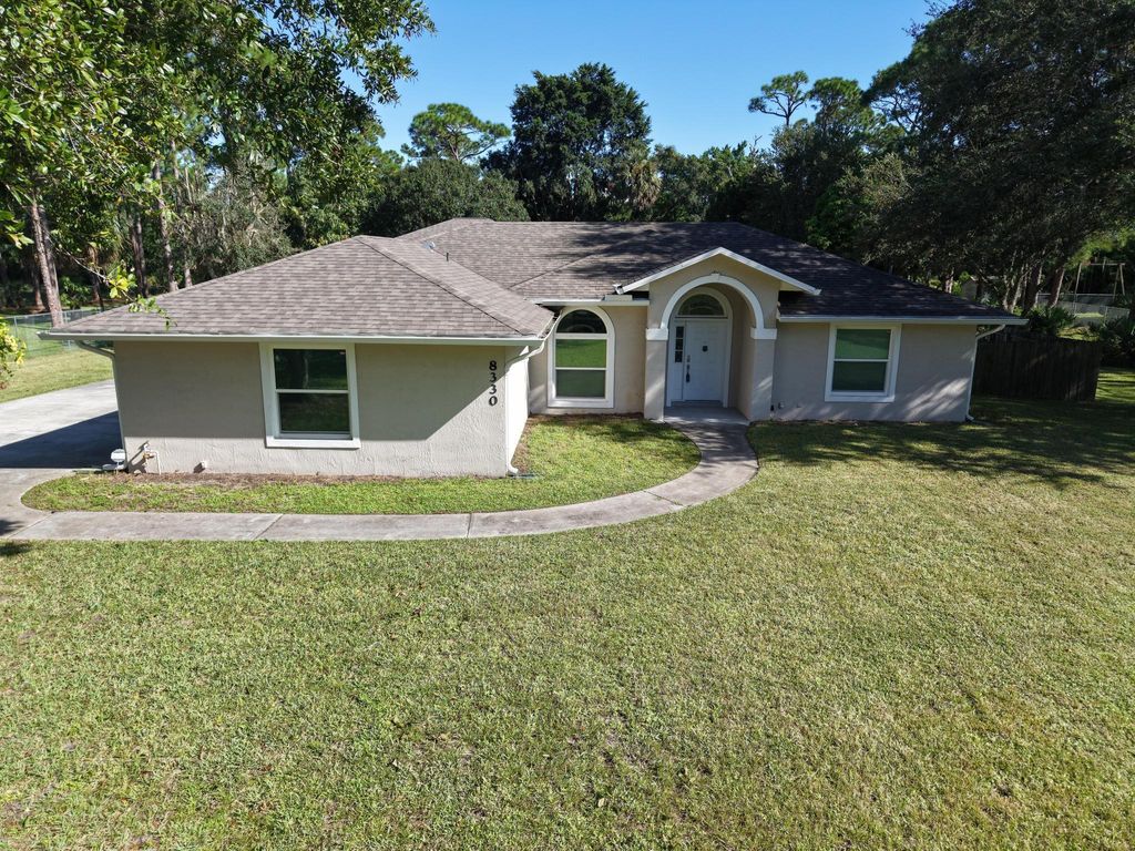 Photo of 8330 Hidden Pines Road, Fort Pierce, FL 34945 (MLS # R11125891)