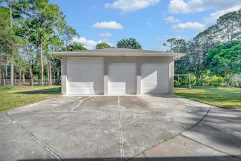 Photo of 8330 Hidden Pines Road, Fort Pierce, FL 34945 (MLS # R11125891)