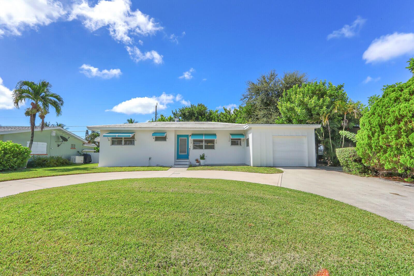 Discover this incredible 2-bedroom, 1.5-bathroom home in the charming North Palm Beach area! The house boasts wood flooring and an open floor plan. An extra-large, finished garage room adds to its appeal. Situated on a nice lot with a large backyard, it is centrally located, providing easy access to schools, major highways, shopping, and both upscale and casual dining options. Just minutes from the beach, fishing, boating, surfing, theater, and golf, this unique home offers an exceptional lifestyle.