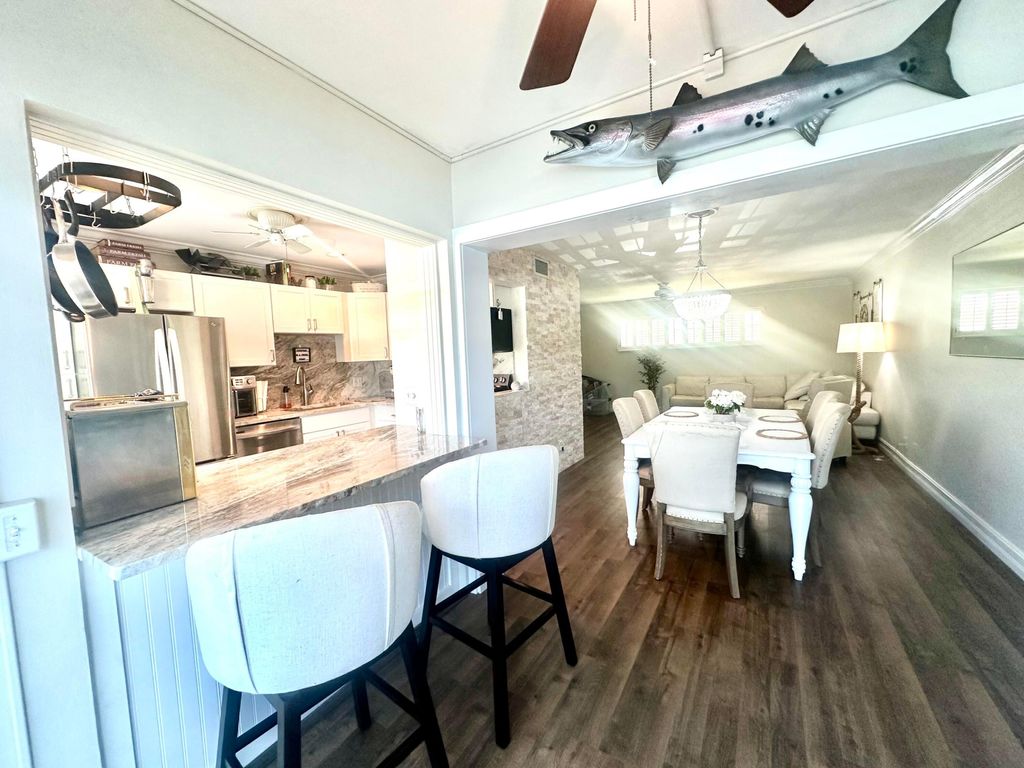 Photo of 34 Colonial Club Drive #103, Boynton Beach, FL 33435 (MLS # R11015445)