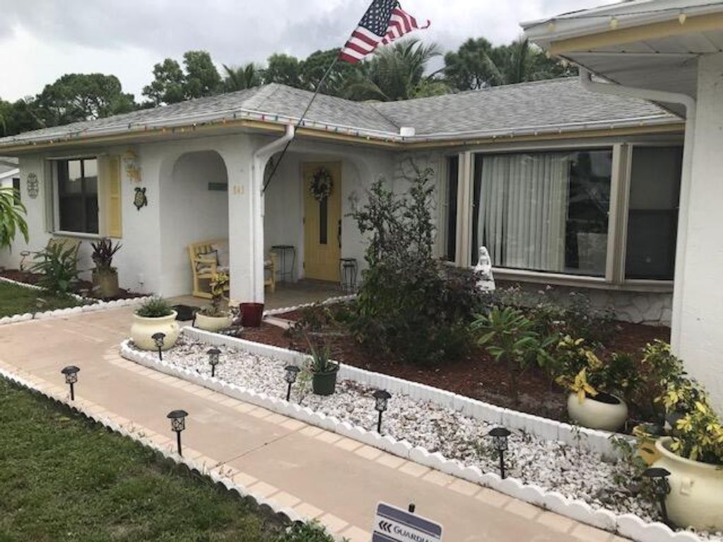 Photo of 843 SE Polynesian Avenue, Port Saint Lucie, FL 34983 (MLS # R10736487)