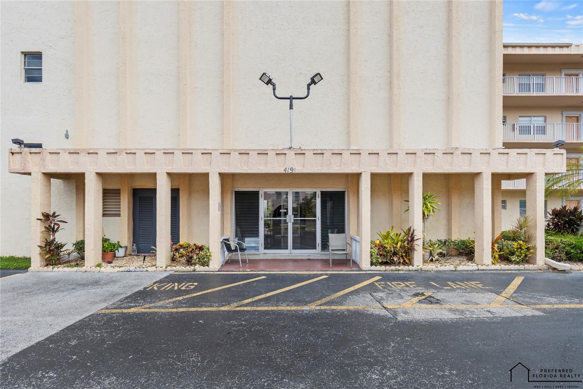 Spacious 2-bedroom, 2-bath condo located in the desirable Pearl Condominium community of Lauderdale Lakes. This light-filled unit features a functional split floor plan, open living and dining area, and a screened balcony with peaceful views. The primary suite offers generous closet space and an en-suite bath. Sliding door and master bedroom door are upgraded to high-impact glass for safety and energy efficiency. Enjoy a well-maintained building with secure entry, community pool, and clubhouse. Conveniently located near shops, dining, and major highways. Unit can be sold furnished or unfurnished, making it a flexible option for buyers. for year-round living or as an investment property.