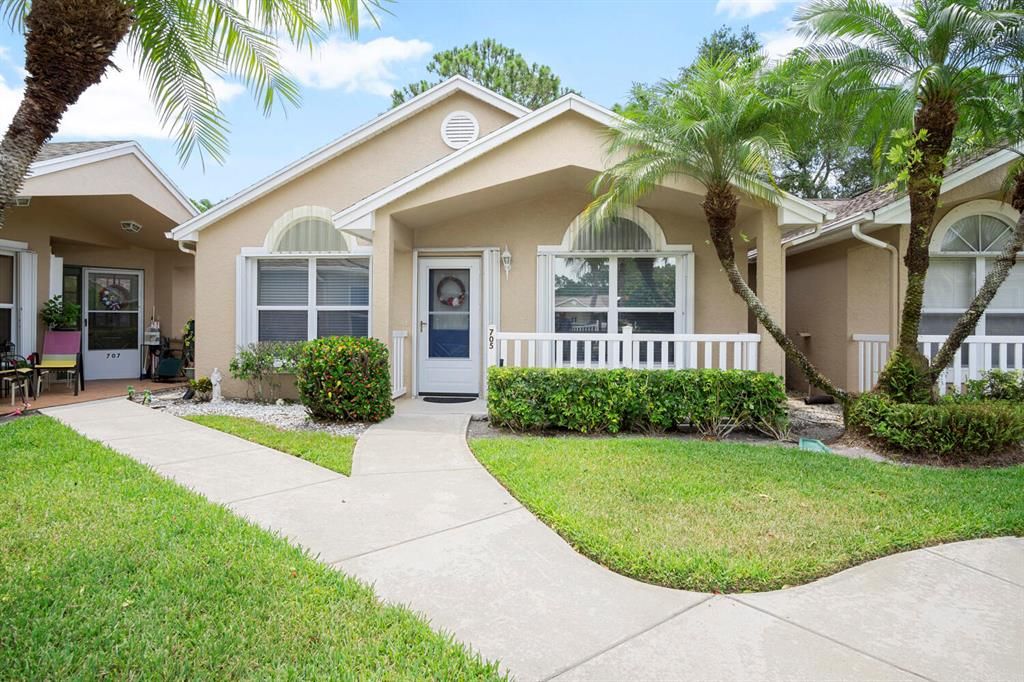 Photo of 705 NW San Remo Circle Cir, Port Saint Lucie, FL 34986 (MLS # R10812008)