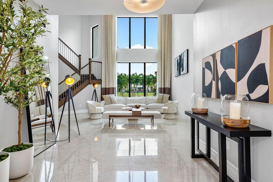 Welcome to the epitome of luxurious living at Boca Bridges! Presenting the exquisite Bassano Grande Model Home, a masterpiece spanning 5,890 square feet nestled on a sprawling 0.29-acre lakefront lot. This grand estate boasts 5 lavish bedrooms, each accompanied by its own opulent en-suite bathroom, offering unparalleled comfort and privacy. The spacious and gorgeous master suite features two sumptuous bathrooms (hers/his), 2 separate walking in closets and private balcony.Step inside and be captivated by the sheer elegance of this residence. The grandeur of the home is immediately evident, with a spacious media room, loft, and office providing ample space for leisure and productivity plus 3-car garage. Furniture Negotiable.